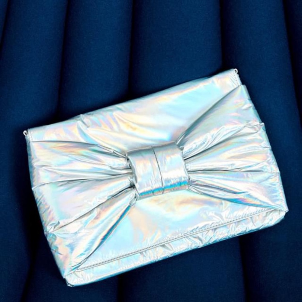 Stella & Dot holographic bow clutch